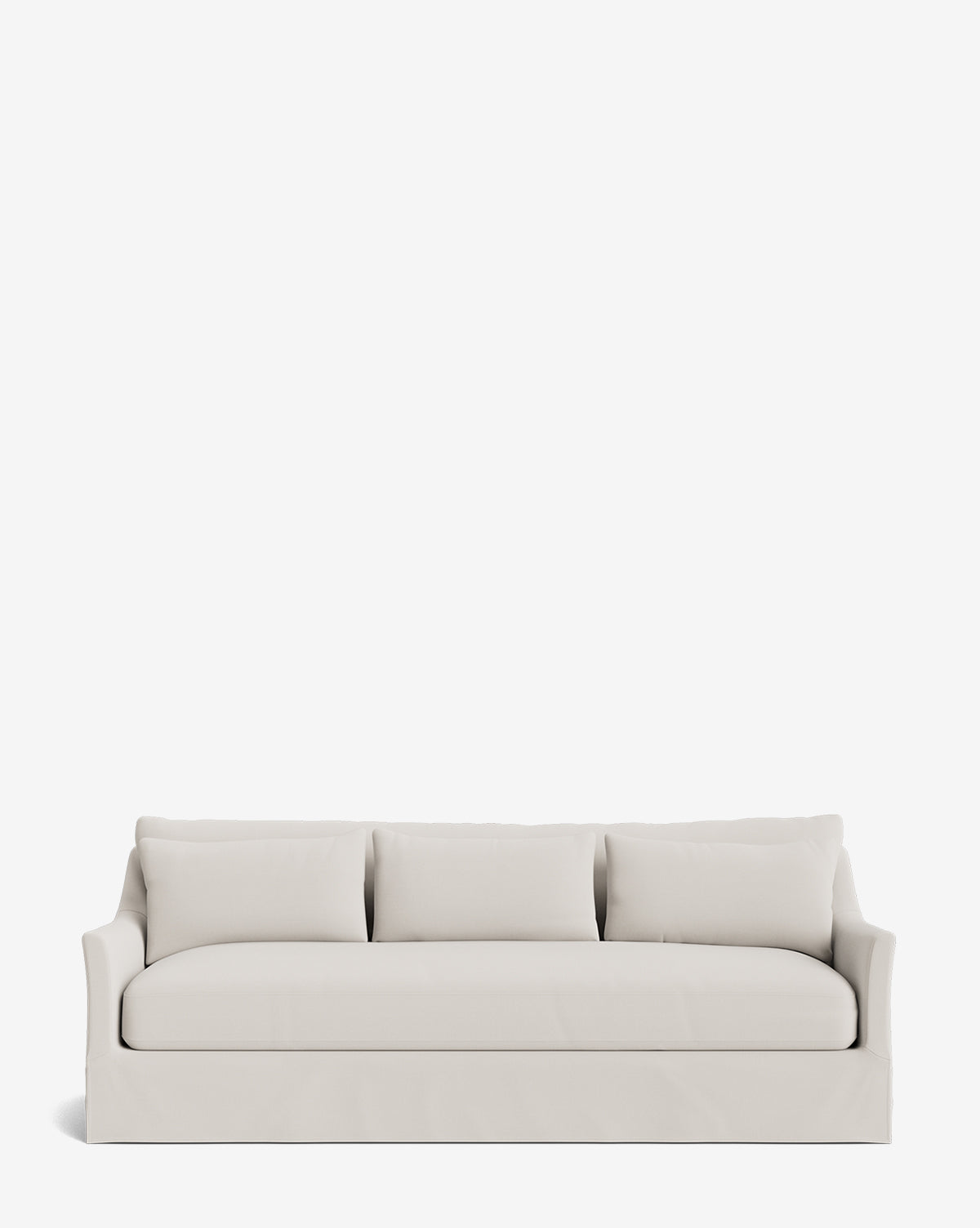 The Wilhelmina Deep Slipcover Sofa (85-110) is a modern three-seater with light beige upholstery, three back cushions, and slightly flared arms, shown against a plain white background by McGee & Co.