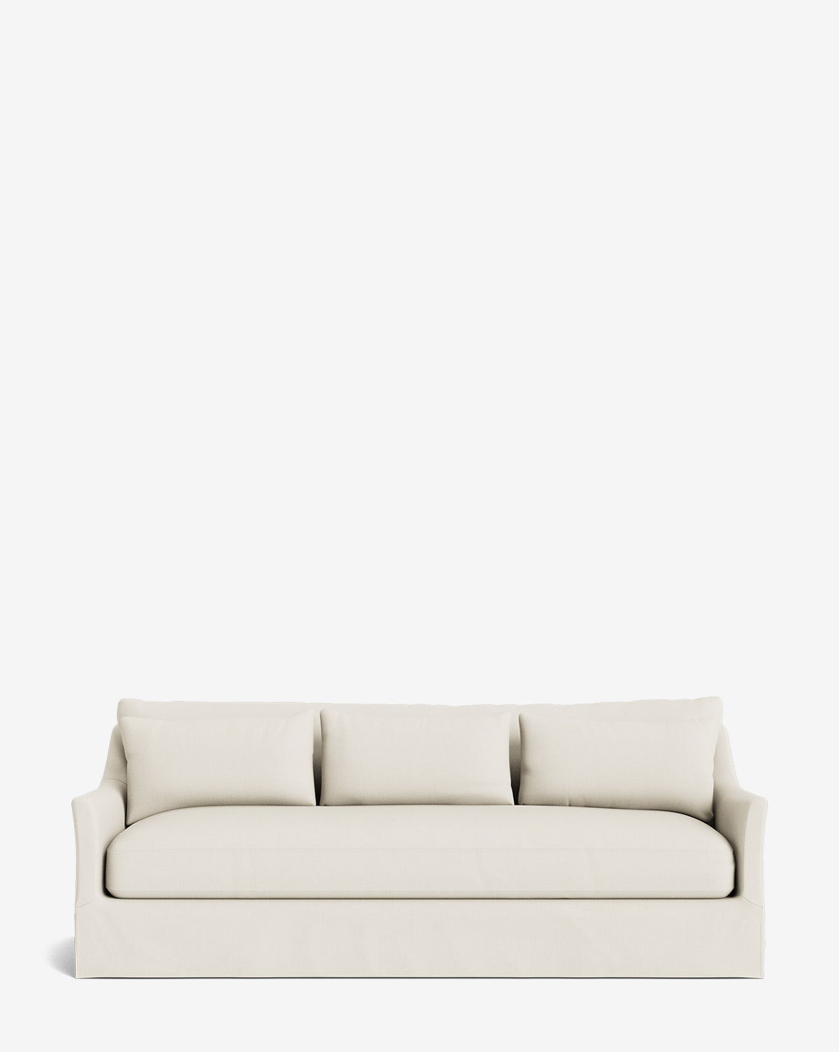 The Wilhelmina Deep Slipcover Sofa (85-110) features a modern cream-colored design with clean lines, three back cushions, and a tailored skirt, providing luxurious seating for three against a plain white background, by McGee & Co.