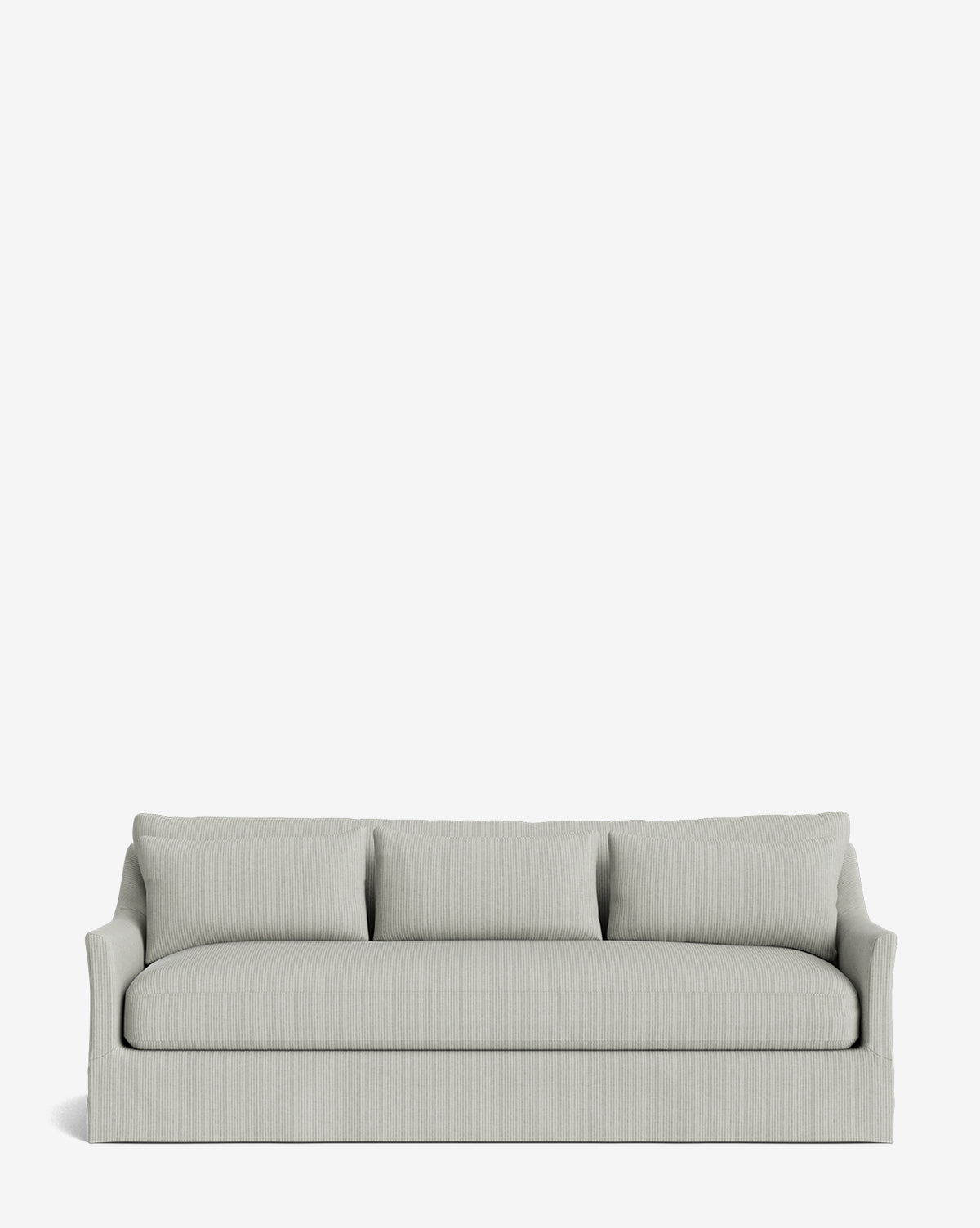 The Wilhelmina Deep Slipcover Sofa (85-110) is a light grey, three-seater with three back cushions and slightly curved armrests, providing a luxurious seat against a plain white background by McGee & Co.