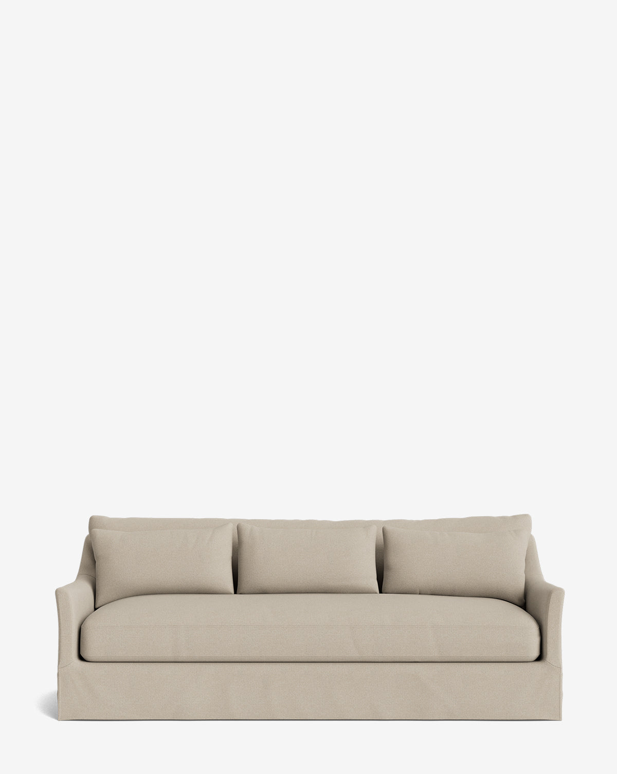 The Wilhelmina Deep Slipcover Sofa (85-110) is a beige, skirted sofa with three back cushions, offering luxurious seating, by McGee & Co. It is displayed against a plain white background.