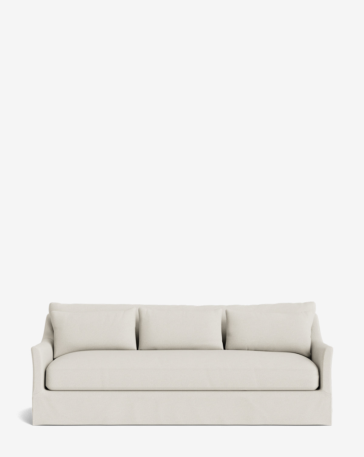 The Wilhelmina Deep Slipcover Sofa (85-110) features a modern, light beige design with three back cushions and low, curved arms, by McGee & Co. Its minimalist style offers luxurious comfort and is shown against a plain white background.