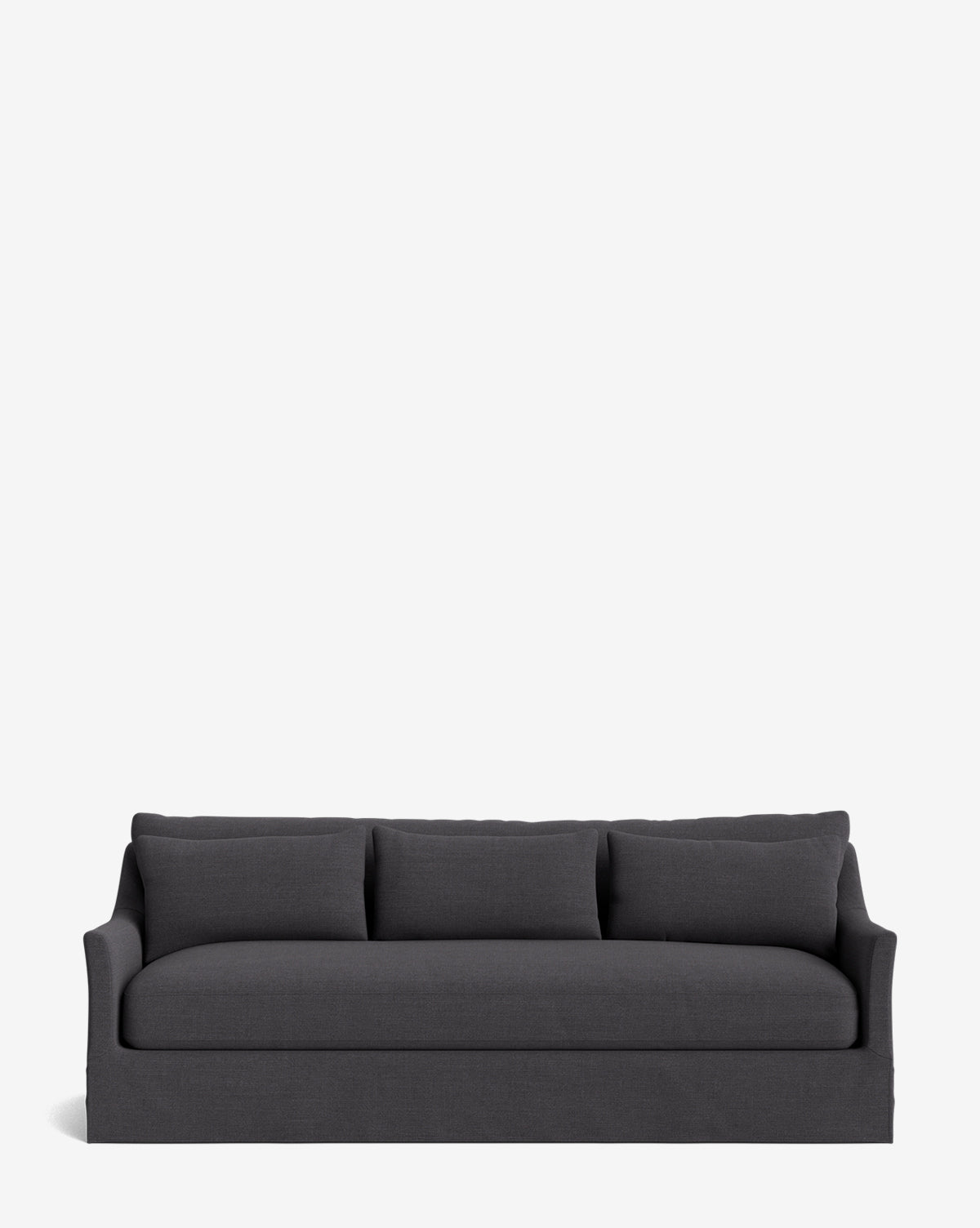 The Wilhelmina Deep Slipcover Sofa (85-110) in dark gray seats three with matching back cushions and simple armrests, providing a luxurious look against a plain white background, by McGee & Co.