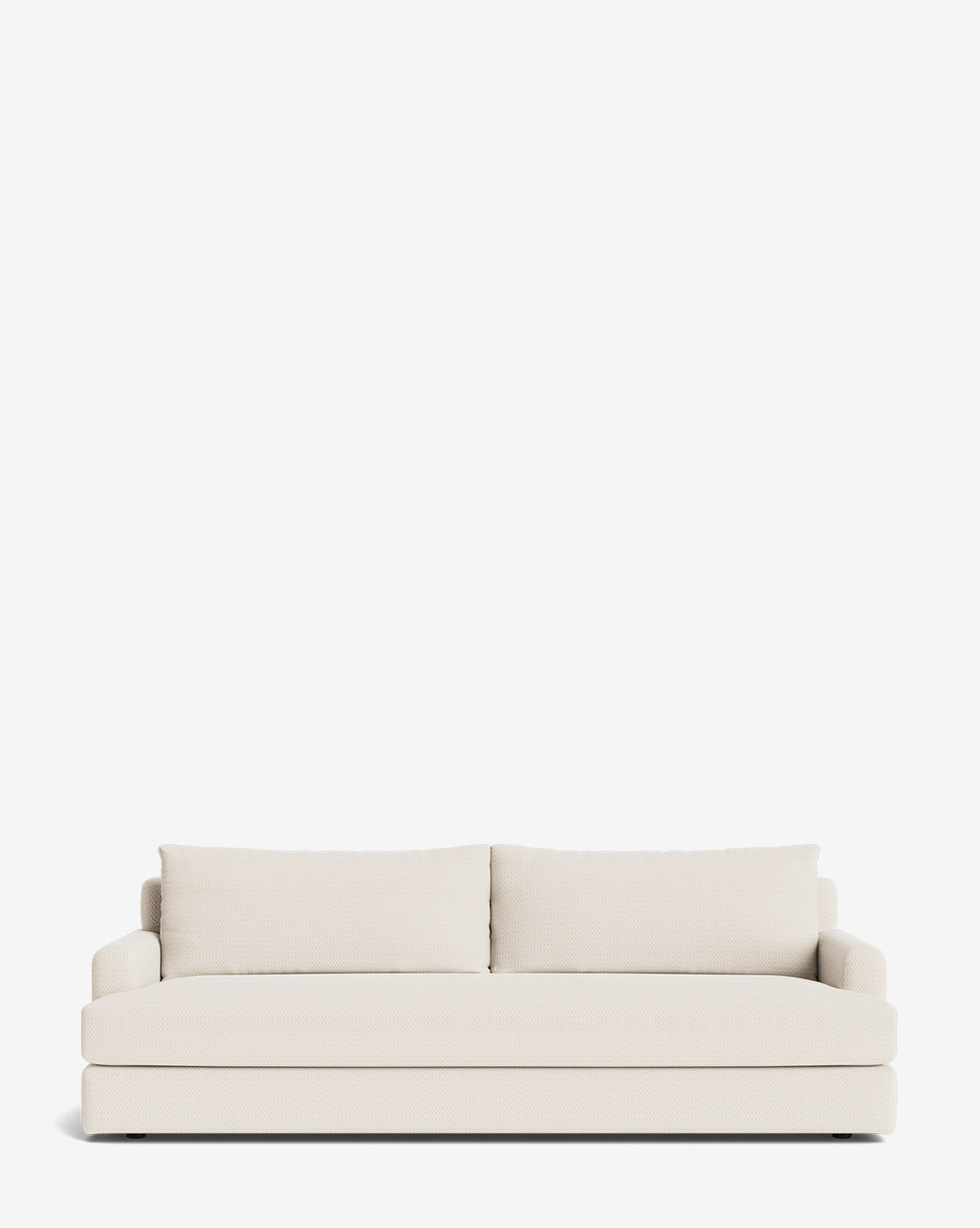 The Winthrop Sofa 90 is a modern, off-white upholstered sofa featuring two seat cushions and two large back cushions, displayed against a plain white background, by McGee & Co.