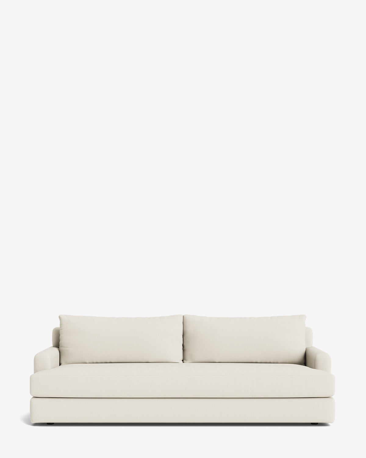 The Winthrop Sofa 90 is a modern, cream-colored sofa with two large back cushions and low armrests. Its minimalist design delivers comfort and sophisticated style, making it a perfect addition to any space by McGee & Co.