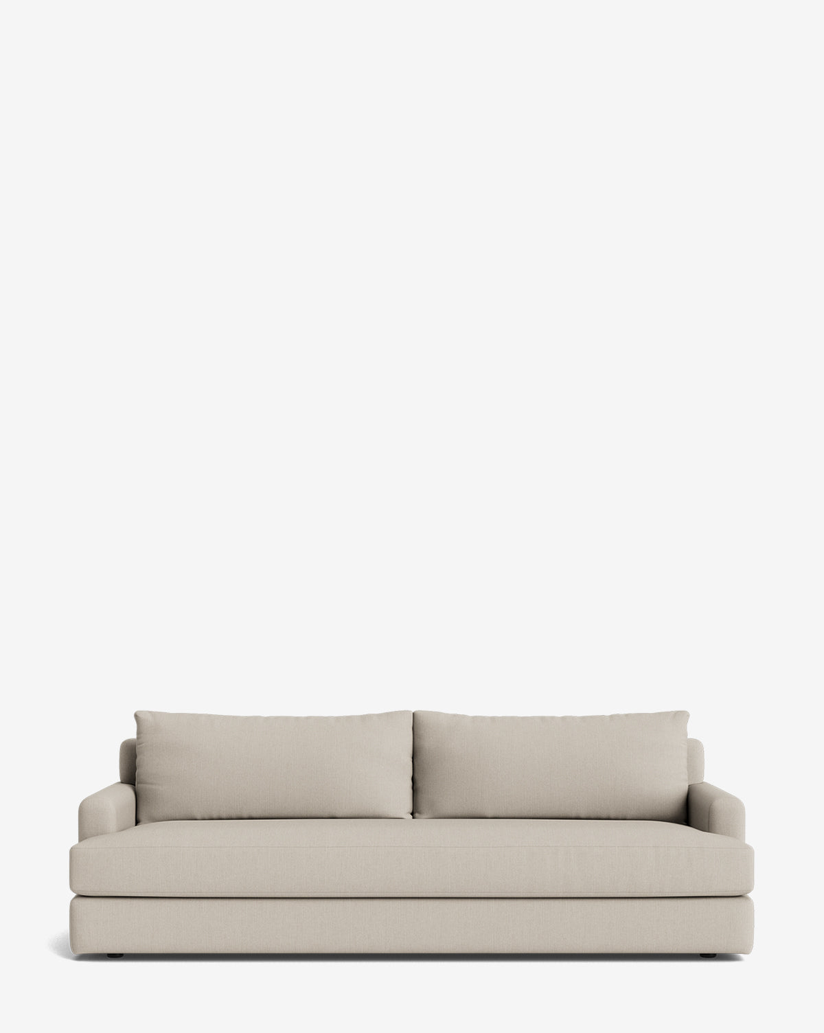 A light beige, contemporary Winthrop Sofa 90 with two seat cushions, two large backrest pillows, straight armrests, and a minimalist design sits against a plain white background by McGee & Co.