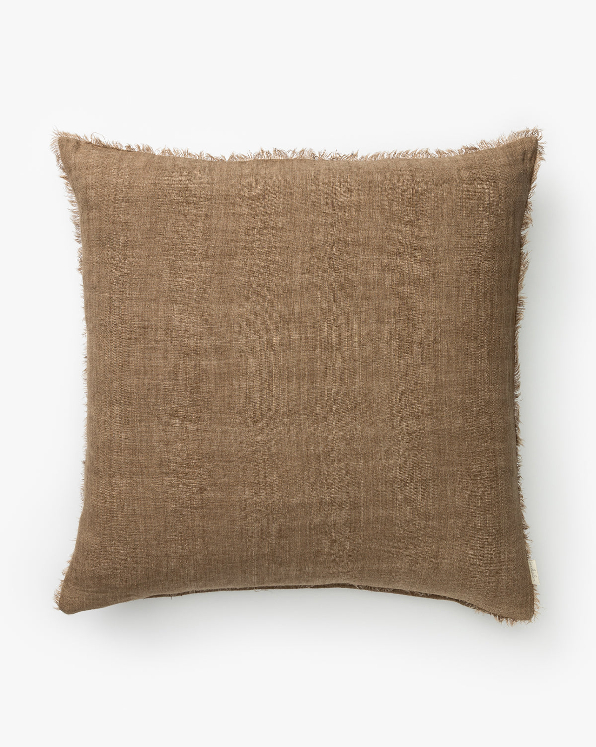 The Adriana Pillow Cover features textured brown fabric with frayed edges, bringing warmth and style to any room, by McGee & Co. Shown on a plain white background.