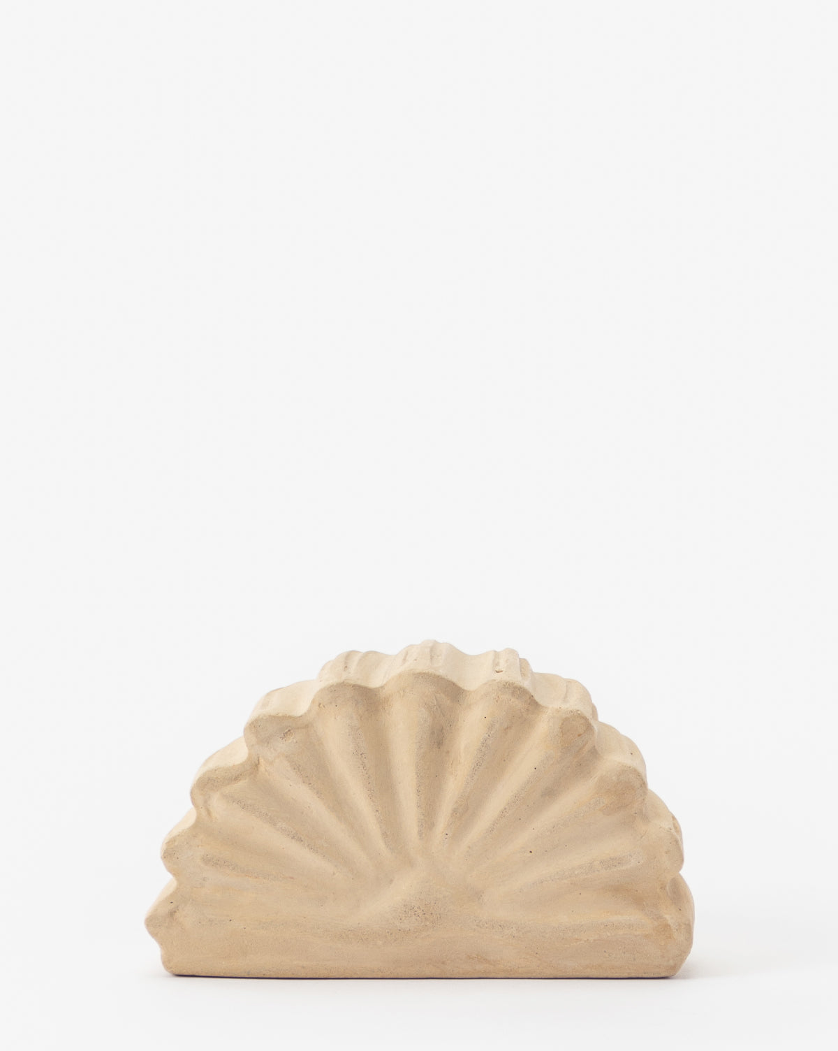 The Baroque Shell Object is a beige, fan-shaped piece crafted from composite stone, featuring a textured, ridged surface and set against a plain white background.