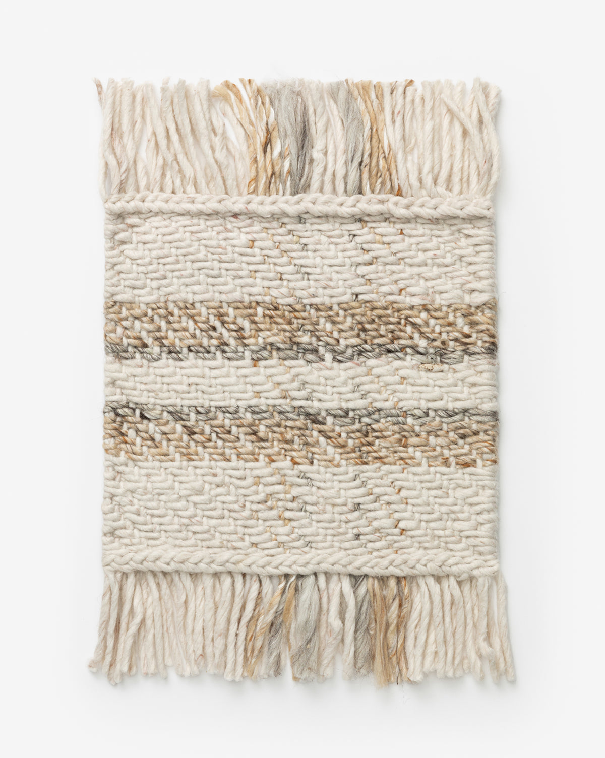 The Callahan Handwoven Indoor/Outdoor Rug Swatch features off-white and beige yarn with brown diagonal stripes and fringed edges—perfect inspiration for your own handwoven rug project, by McGee & Co.