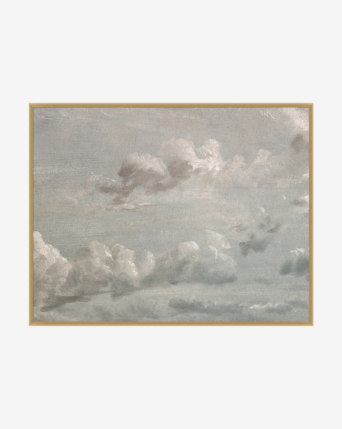 Gray Clouds is wall art featuring soft white and gray clouds on a light blue sky, framed in simple light wood—a perfect choice to add relaxed charm to your home decor.