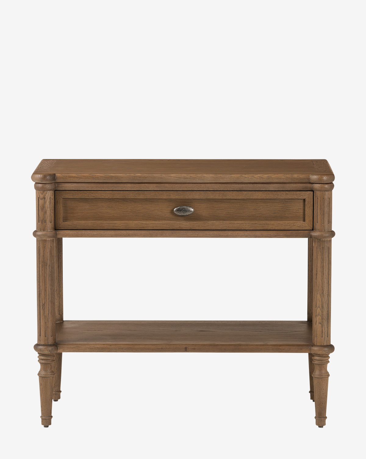 A wooden console table with a round metal handle, open shelf, and tapered legs, showcasing a natural finish and classic design that pairs perfectly with the matching Humphrey Nightstand in traditional bedrooms, by McGee & Co.