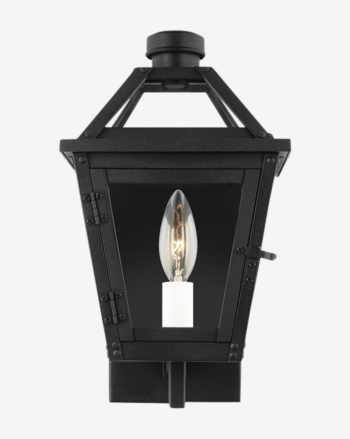 The Hyannis Outdoor Wall Lantern is a black fixture with a classic lantern shape, rust-proof construction, clear glass panels, and a single candle-style bulb inside, by McGee & Co.