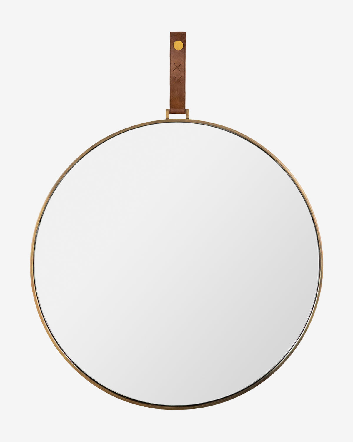 The Laila Circle Mirror boasts a slim gold frame and a chic leather hanger with brass hardware, making it a sophisticated accent on any white wall, by McGee & Co.