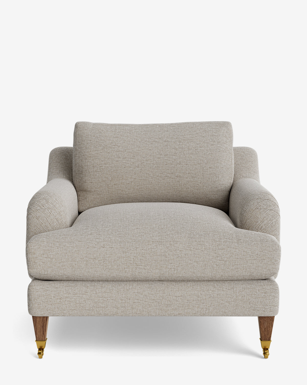 The Lucille English Roll Arm Lounge Chair features a wide, light beige design with plush down-wrapped cushions, wooden legs, and gold caster wheels, shown against a white background by McGee & Co.