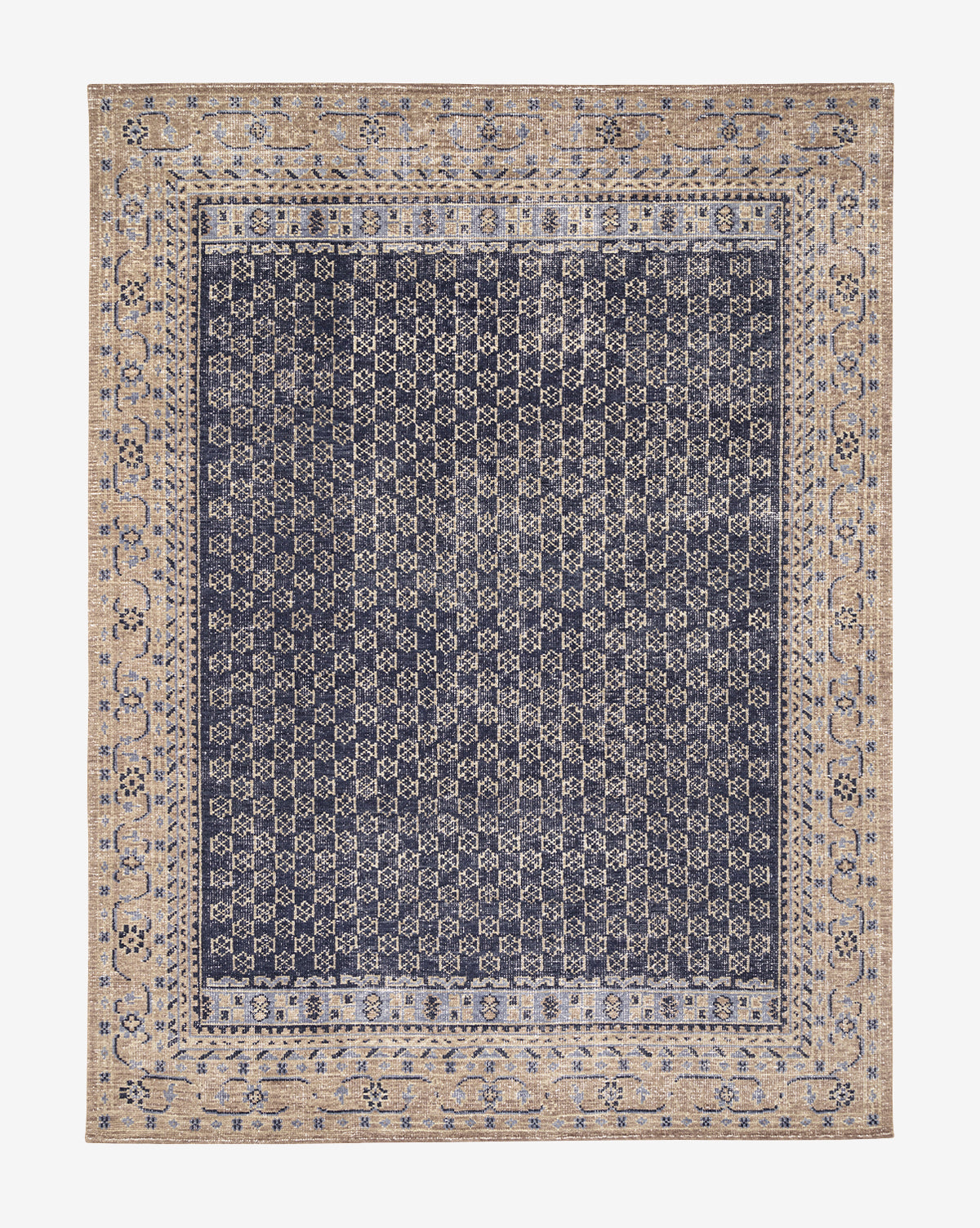 The Anya Indigo Hand-Knotted Wool Rug features a navy blue and beige geometric pattern, wide beige floral border, and a central navy field with an interlocking diamond design in transitional style, by McGee & Co.