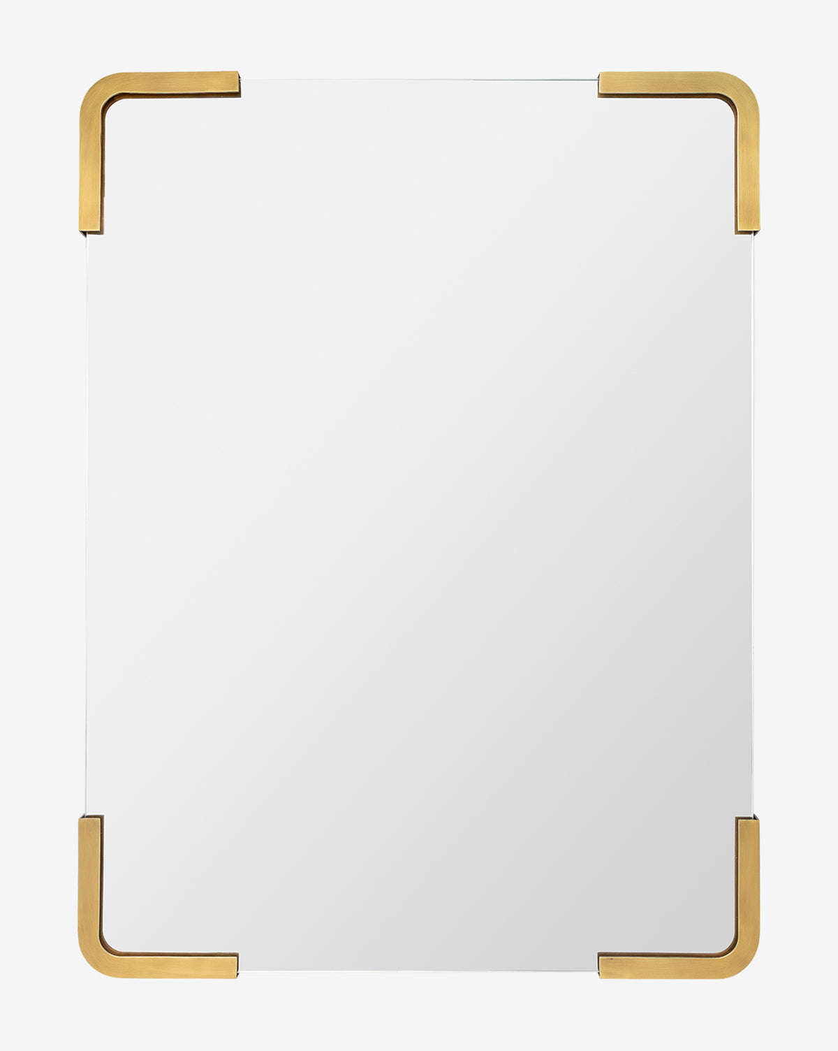 The Mare Mirror is rectangular with a plain surface and four rounded antique brass brackets on each corner, set against a white background for a modern look, by McGee & Co.