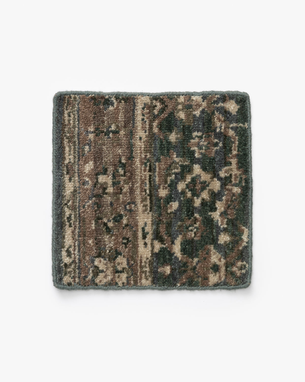 A Marta Hand-Knotted Rug Swatch with a textured, multicolored pattern in brown, tan, and dark green, reminiscent of a classic border rug, is displayed on a white background by McGee & Co.