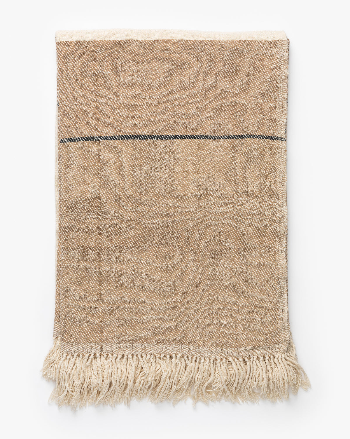 The Murphy Silk Throw features a beige base with a subtle herringbone pattern, a thin dark stripe near one edge, and cream fringe—a hand-loomed, elegant accent for any space.