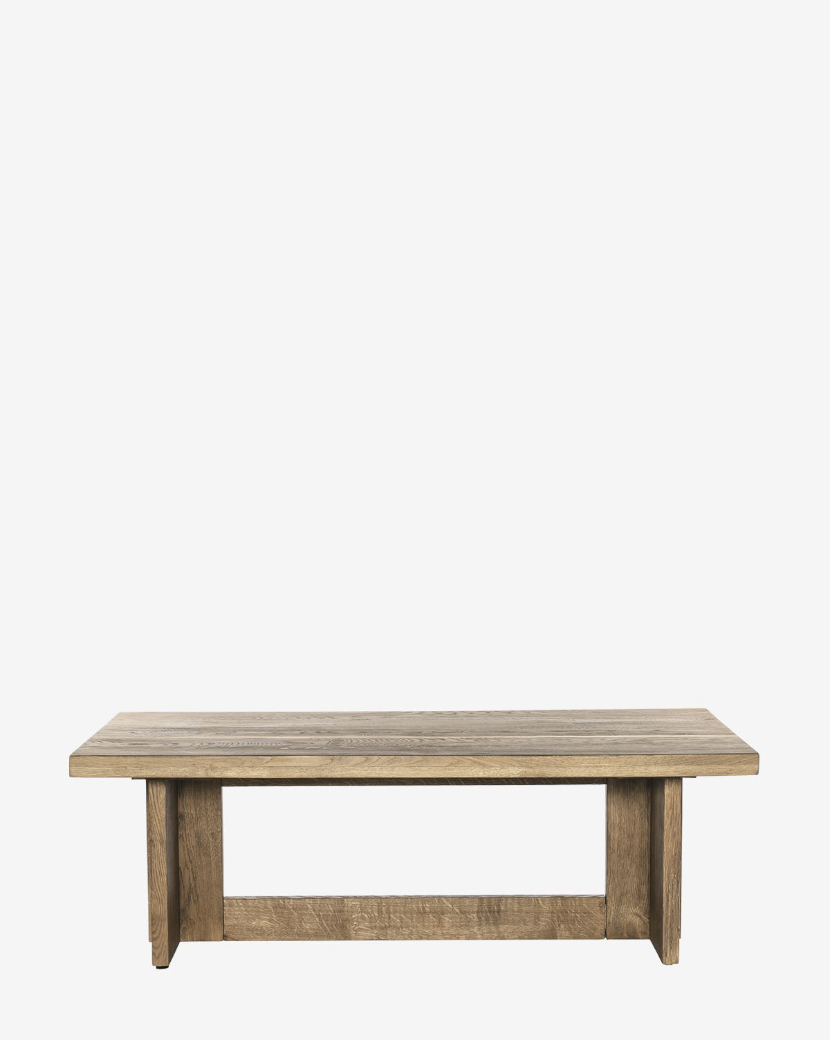 The Ovitt Coffee Table features a simple rectangular design with a flat top and sturdy legs, finished in natural wood. This minimalist living room piece is displayed against a plain white background, by McGee & Co.