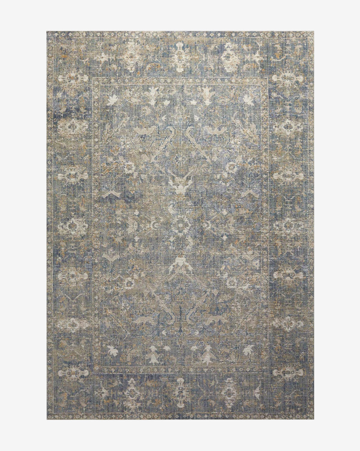 The Rosemarie Collection No. 3 is a vintage low pile rug with a faded blue and beige floral pattern and decorative border, offering a distressed, timeless look, by McGee & Co.