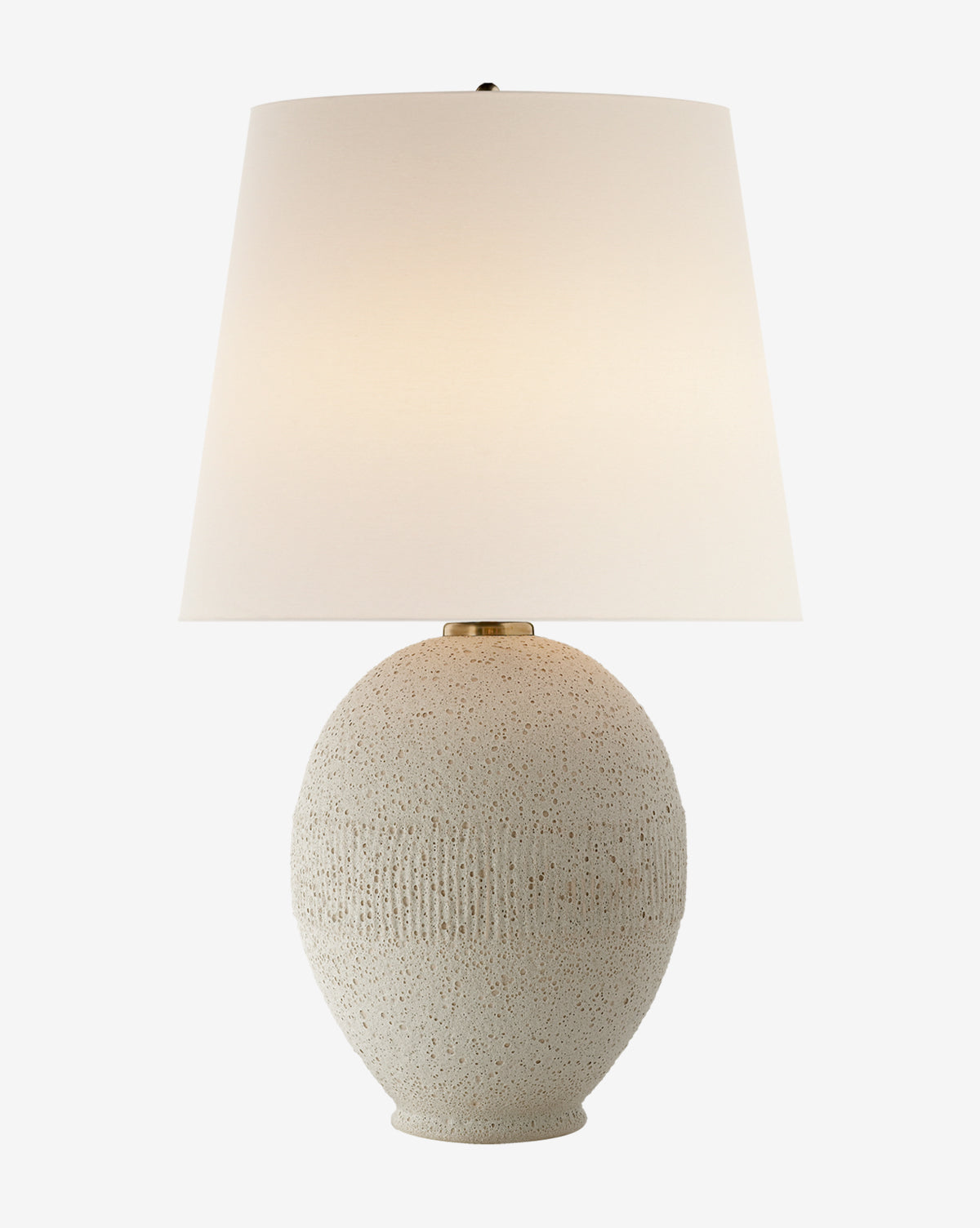 The Toulon Table Lamp features an off-white oval ceramic base with an oceanic natural texture and a large white linen shade, displayed against a plain white background, by McGee & Co.