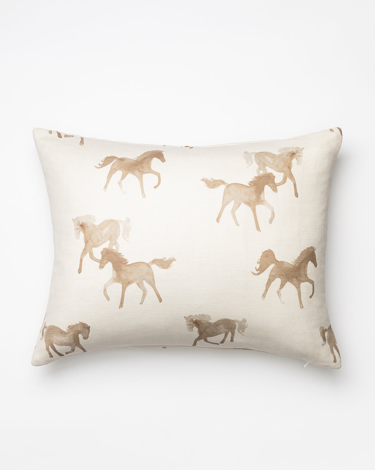 The Watercolor Horses Pillow Cover features a cream background with light brown horses in playful running poses, adding charm and style to any kids bedroom pillow collection, by McGee & Co.