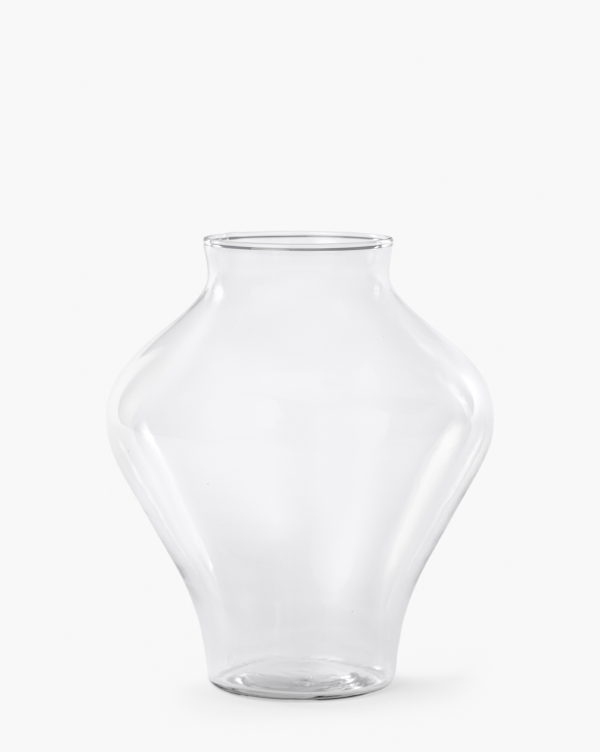 The Allaire Glass Vase is a clear, handblown piece featuring a wide, rounded body that tapers at the neck and base, shown against a plain white background, by McGee & Co.