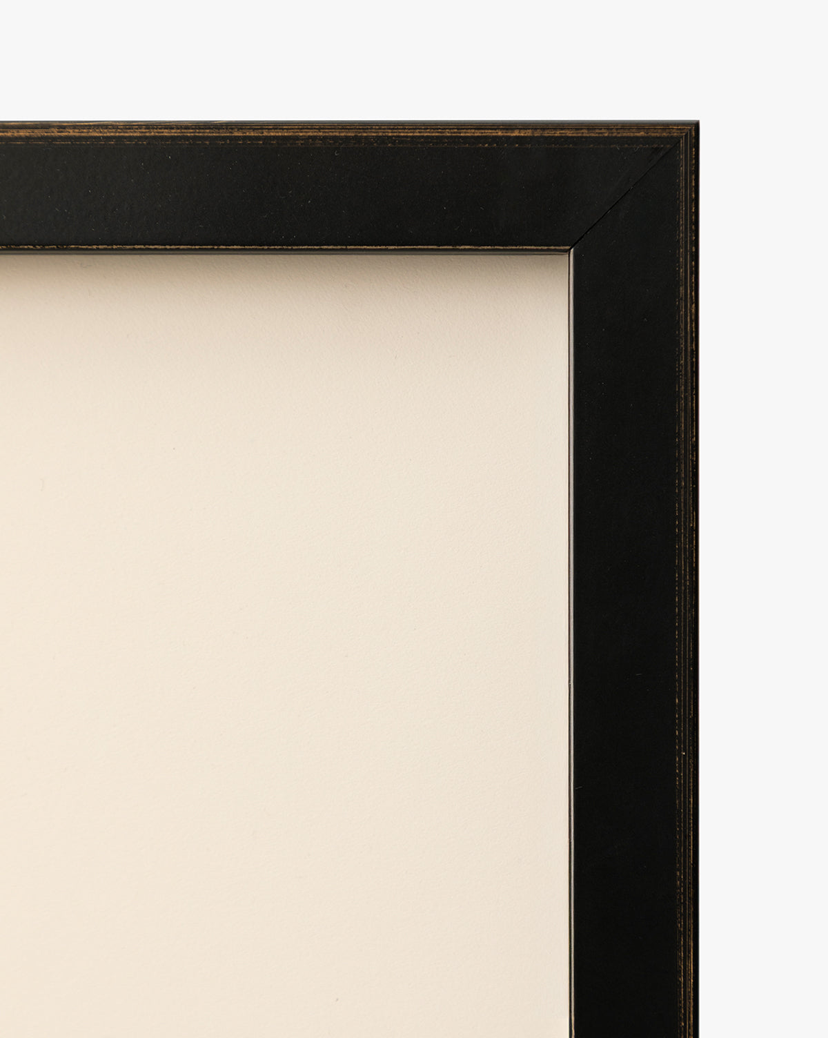 A close-up of the top right corner of a black picture frame with Bright Horizons by Donna Thomas on a cream-colored background—perfect for displaying your favorite wall art, by McGee & Co.