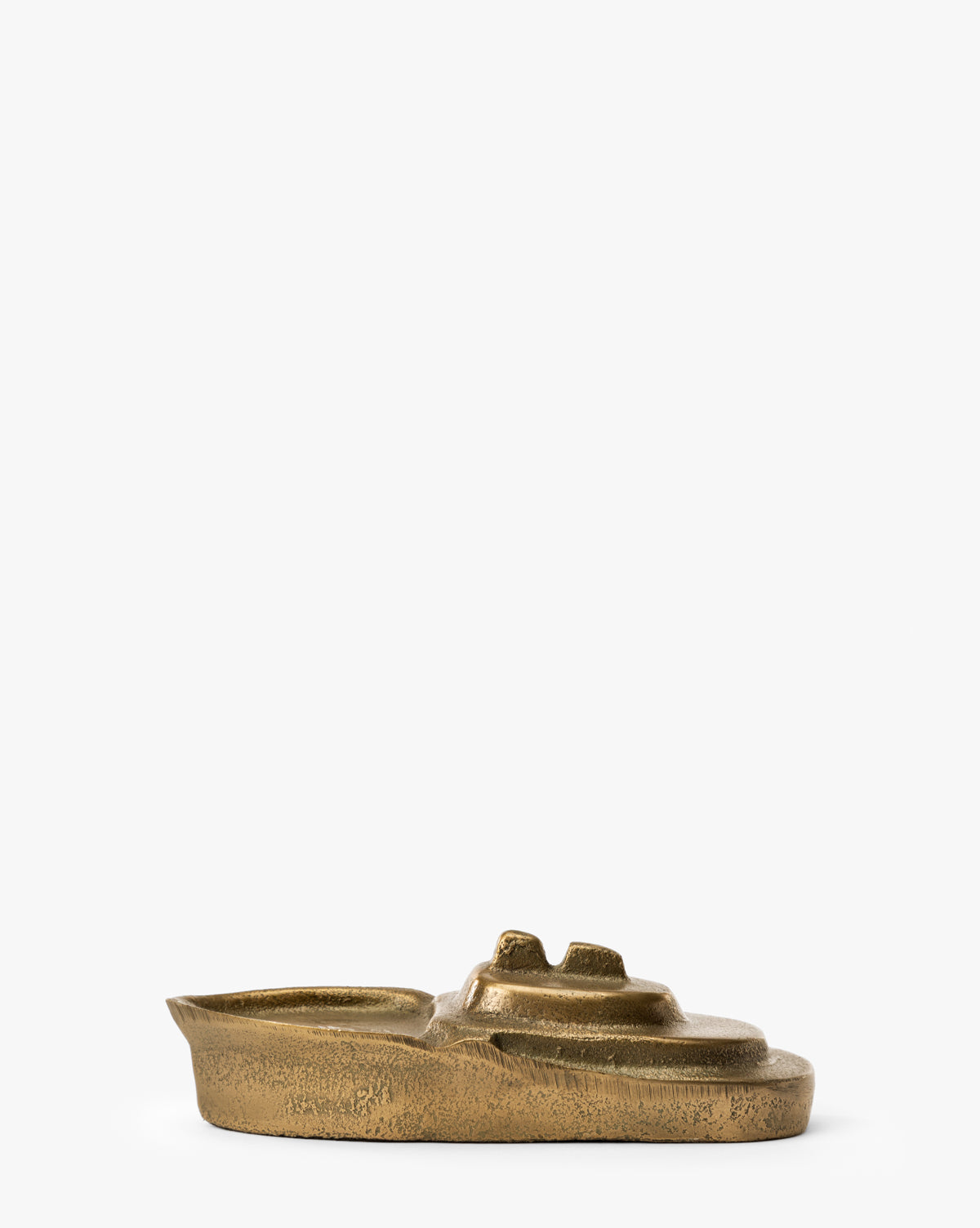 The Cast Aluminum Boat Object is a small, bronze-colored sculpture with an abstract, minimalist design and antique finish—ideal for nautical decor and displayed against a plain white background by McGee & Co.