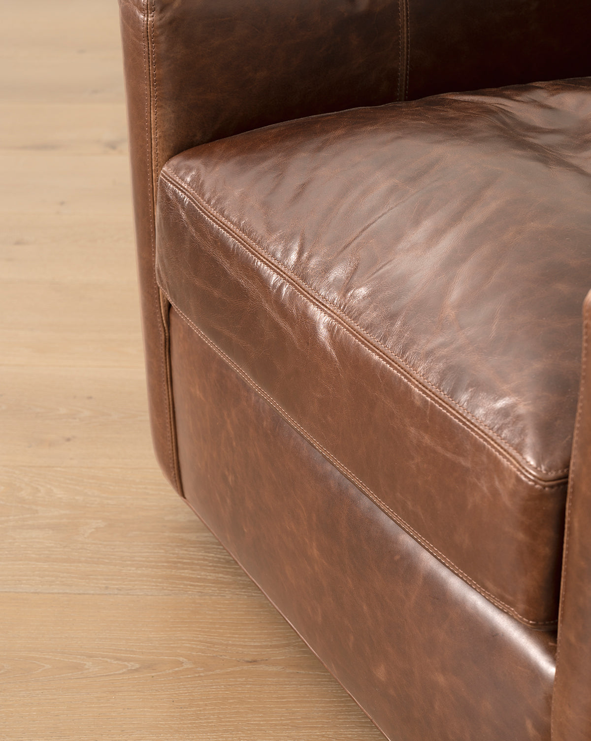 Cliffton Leather Swivel Lounge Chair