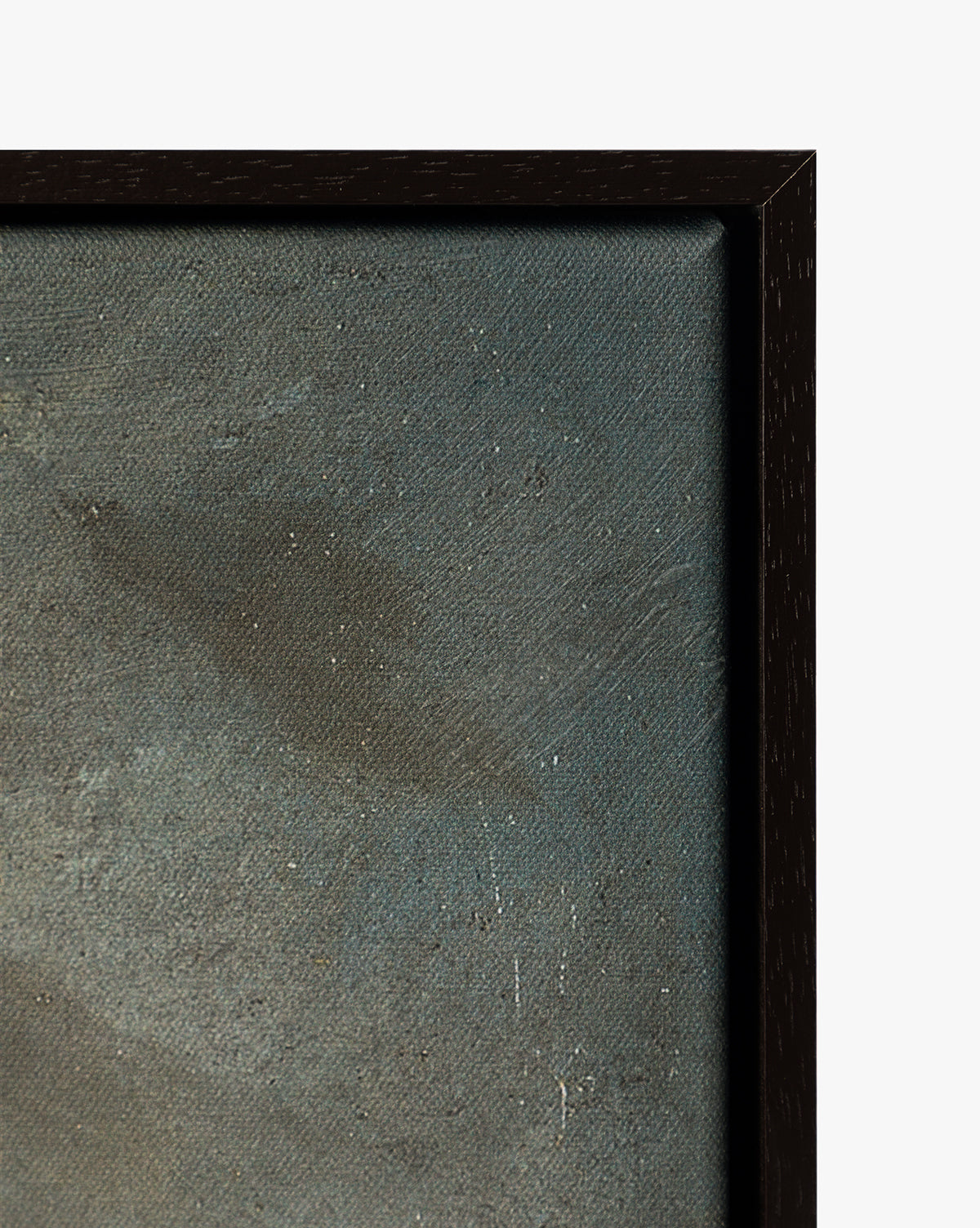 Close-up of the top right corner of Dark Skies Ahead—an abstract giclée canvas with textured gray-blue brushstrokes in a dark espresso floater frame, by McGee & Co.
