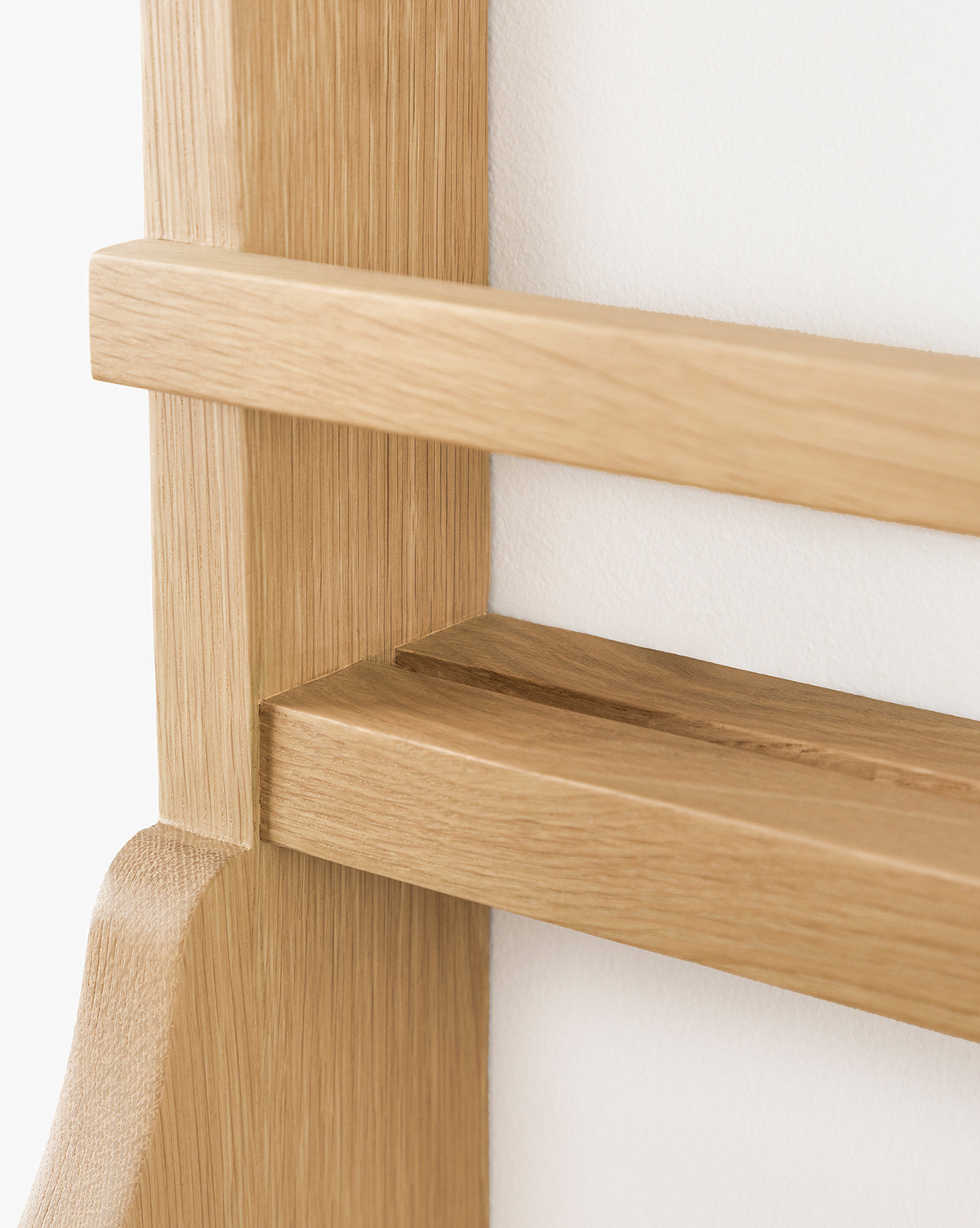 Close-up of the Edna Kitchen Shelf, featuring a smooth natural finish and minimalist open shelving design with straight lines, mounted on a white wall, by McGee & Co.