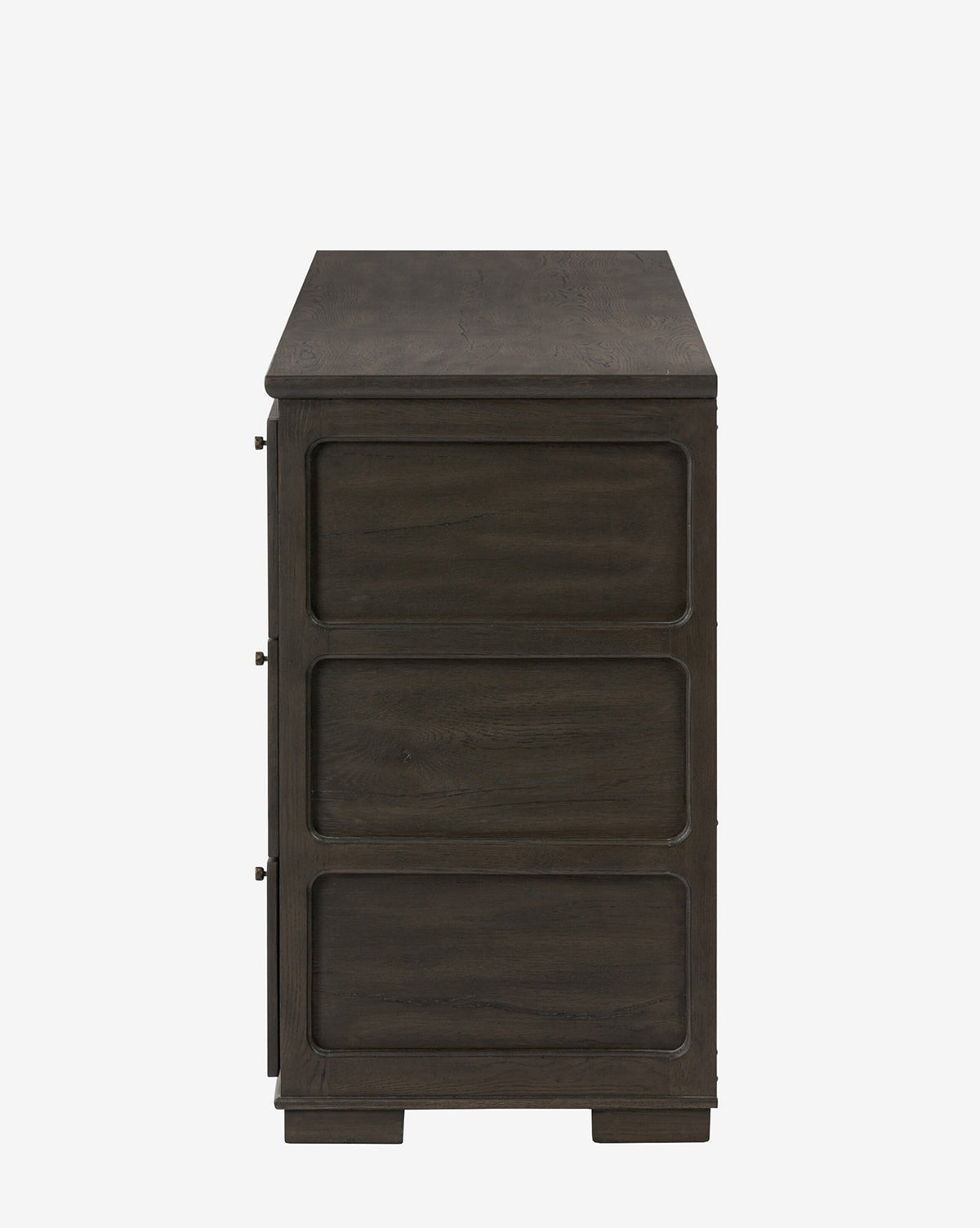Side view of the Eldoria Oak Sideboard in black oak, showcasing three rectangular panels and clean, handle-free lines against a white background for a modern, minimalist look, by McGee & Co.
