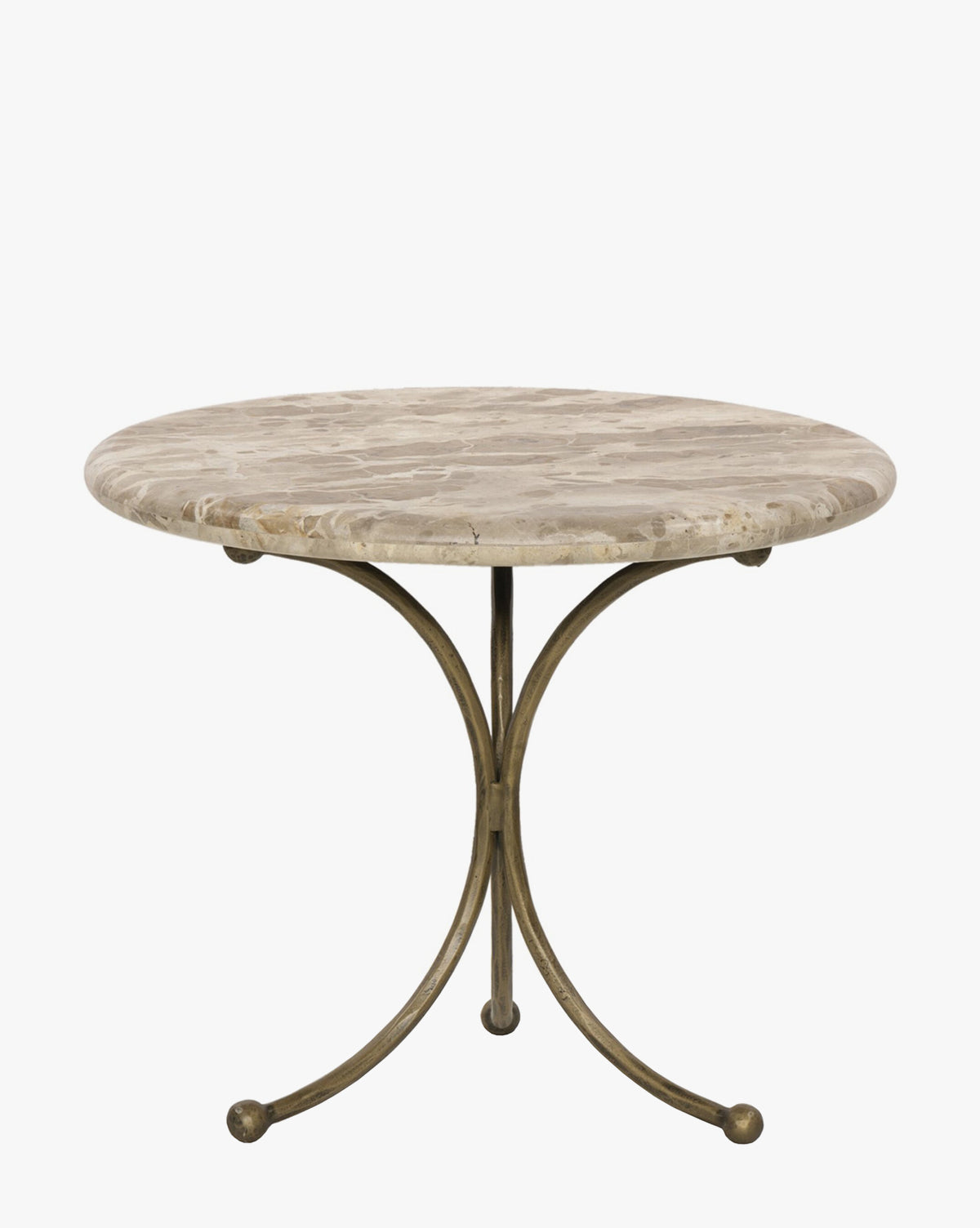 The Fossil Marble End Table showcases a round marble top with a light brown pattern and a curved sculptural base in hammered aged brass, combining an elegant smooth surface with an antique brass finish for timeless appeal, by McGee & Co.