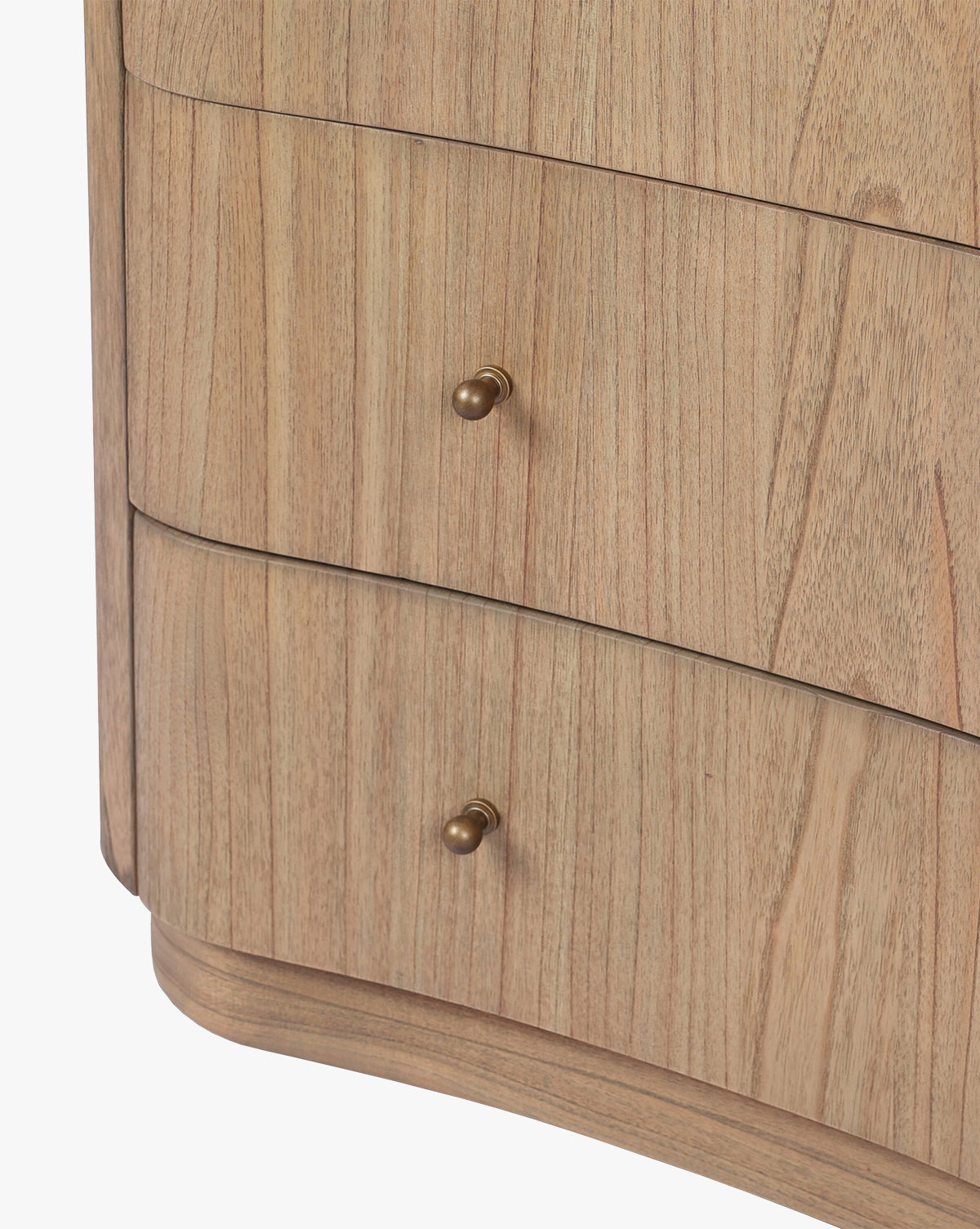 Close-up of the Gatlin Chest, crafted from solid mindi wood with a natural finish. Features two spacious drawers with round, brass-colored knobs, by McGee & Co.
