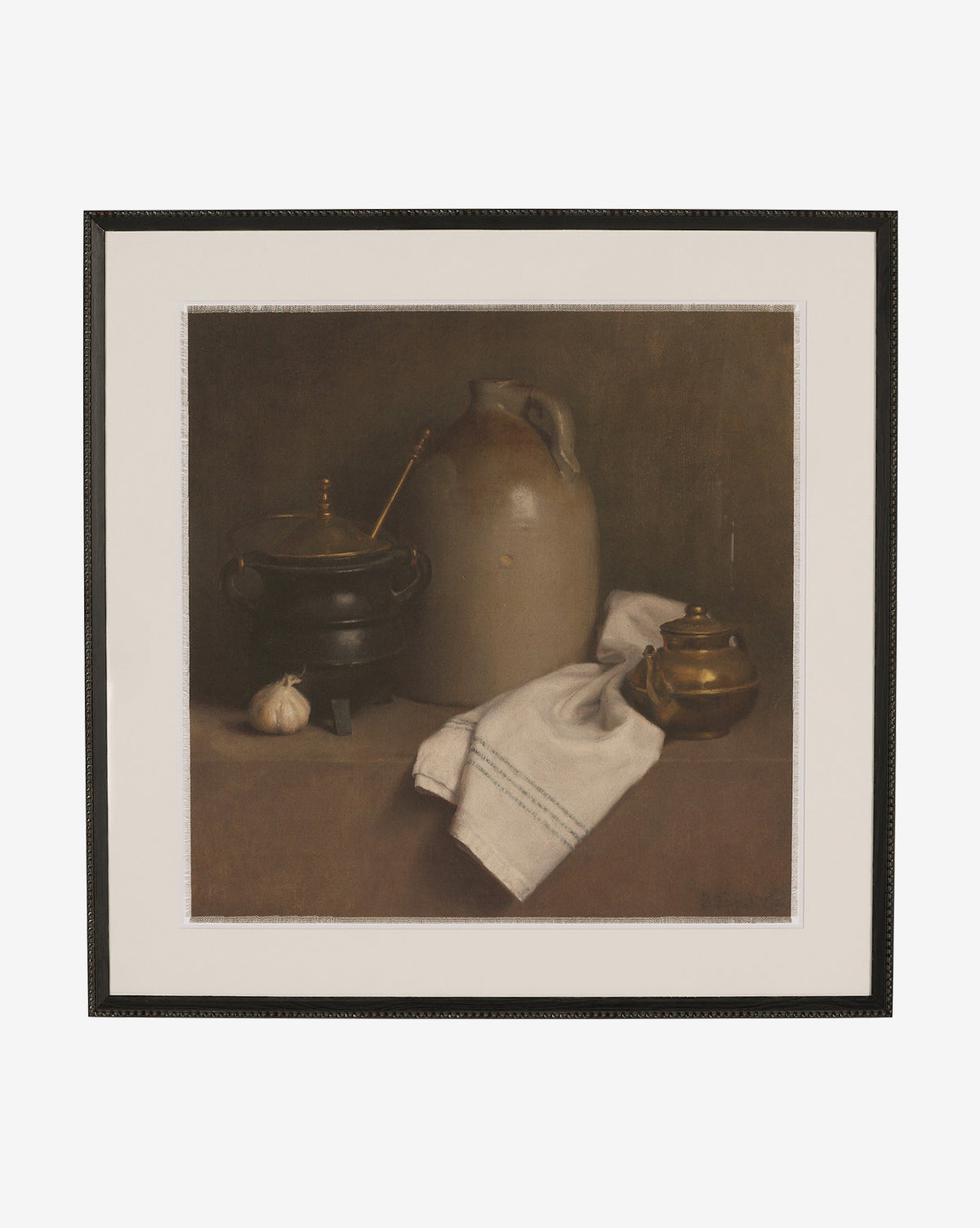 “Iron and Brass by Bethany Joseph” is a framed still-life oil painting in a Brimfield black frame, depicting a ceramic jug, brass teapot, black pot with ladle, white cloth, and garlic bulb on a table against a dark background by McGee & Co.