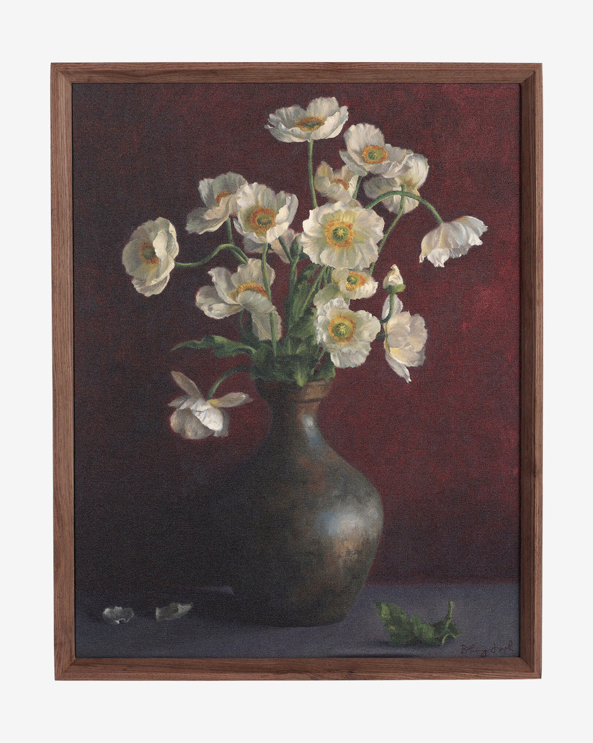 “Jubilee” by Bethany Joseph is a framed oil still life painting featuring white blooms with yellow centers in a dark vase, scattered petals and green leaves on the table, set against a deep red background. Handmade in Austin, by McGee & Co.