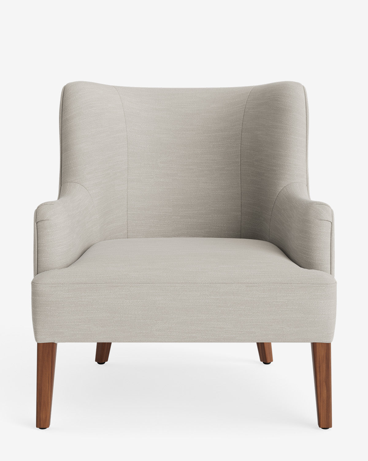 The Marion Lounge Chair features light gray performance fabric, a high wingback design, and four angled wooden legs, shown against a plain white background by McGee & Co.