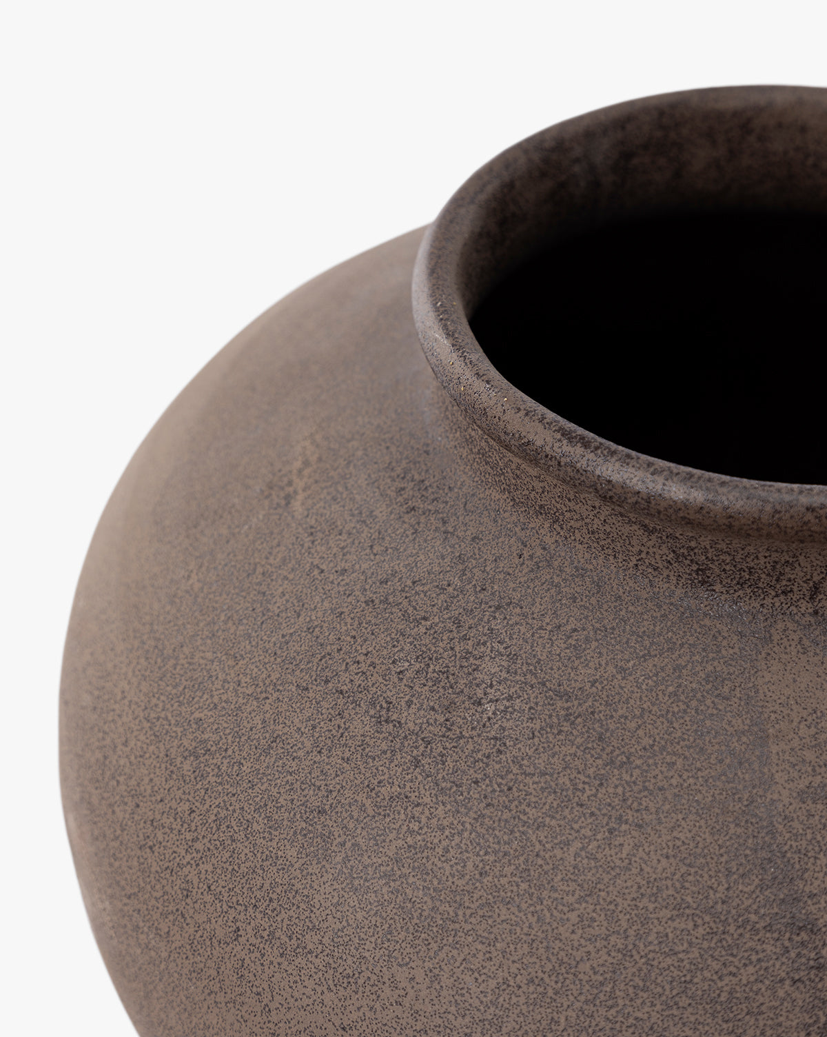 Close-up of the Reading Vase, a round, textured matte brown ceramic piece with a wide opening—ideal for modern home decor, by McGee & Co. Shown against a white background.