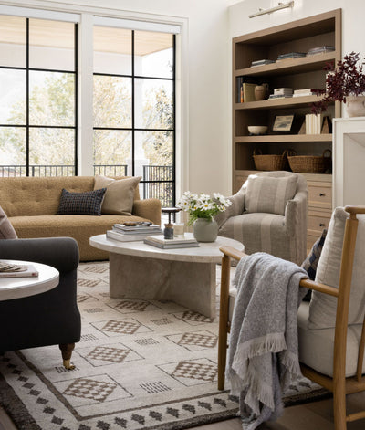 An elegant hand-knotted rug in a beautifully designed living space.