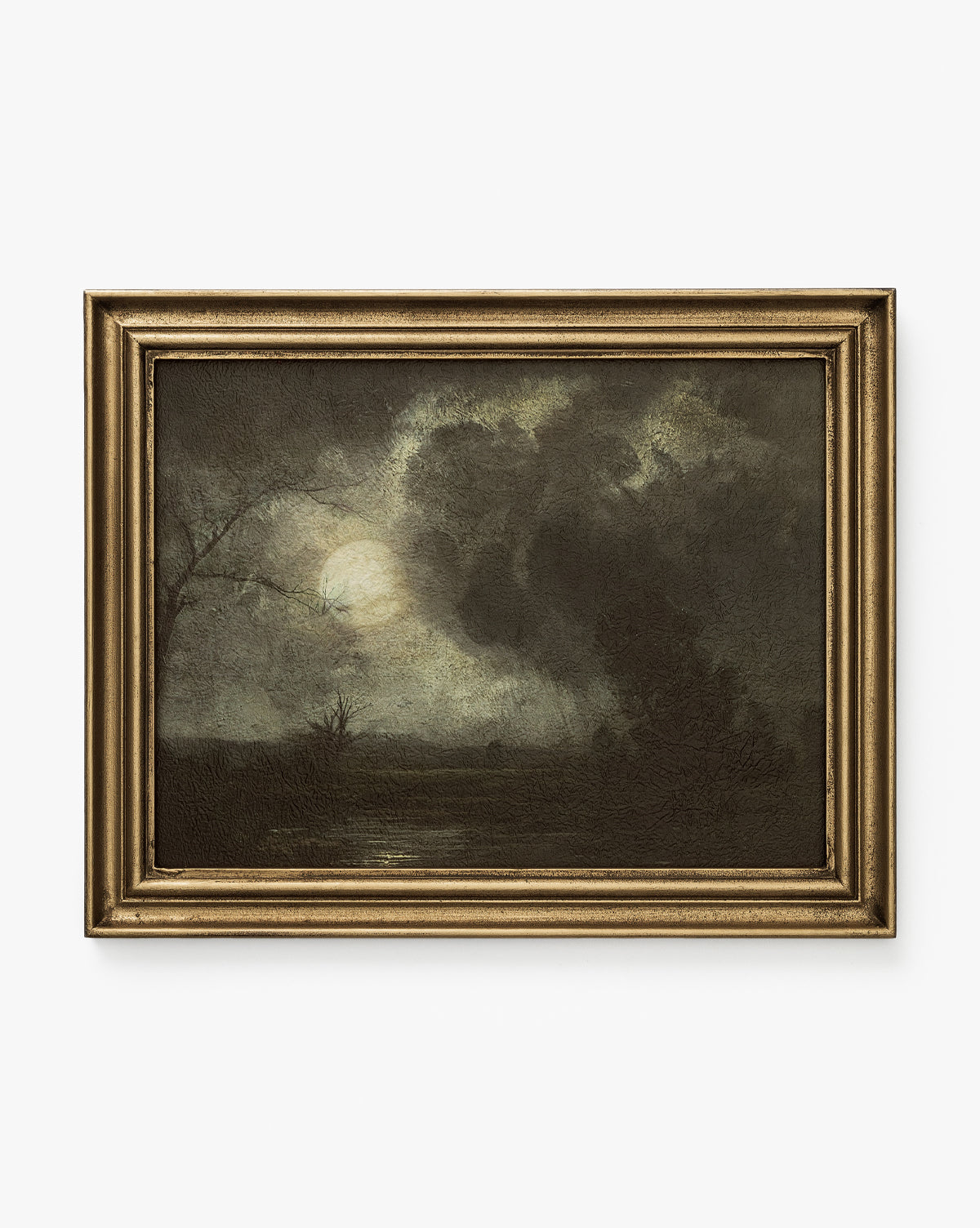 Storm on the Lake is a framed painting featuring a spooky landscape with a cloudy night sky, full moon, barren trees, and a quiet lake—an evocative piece of home decor.