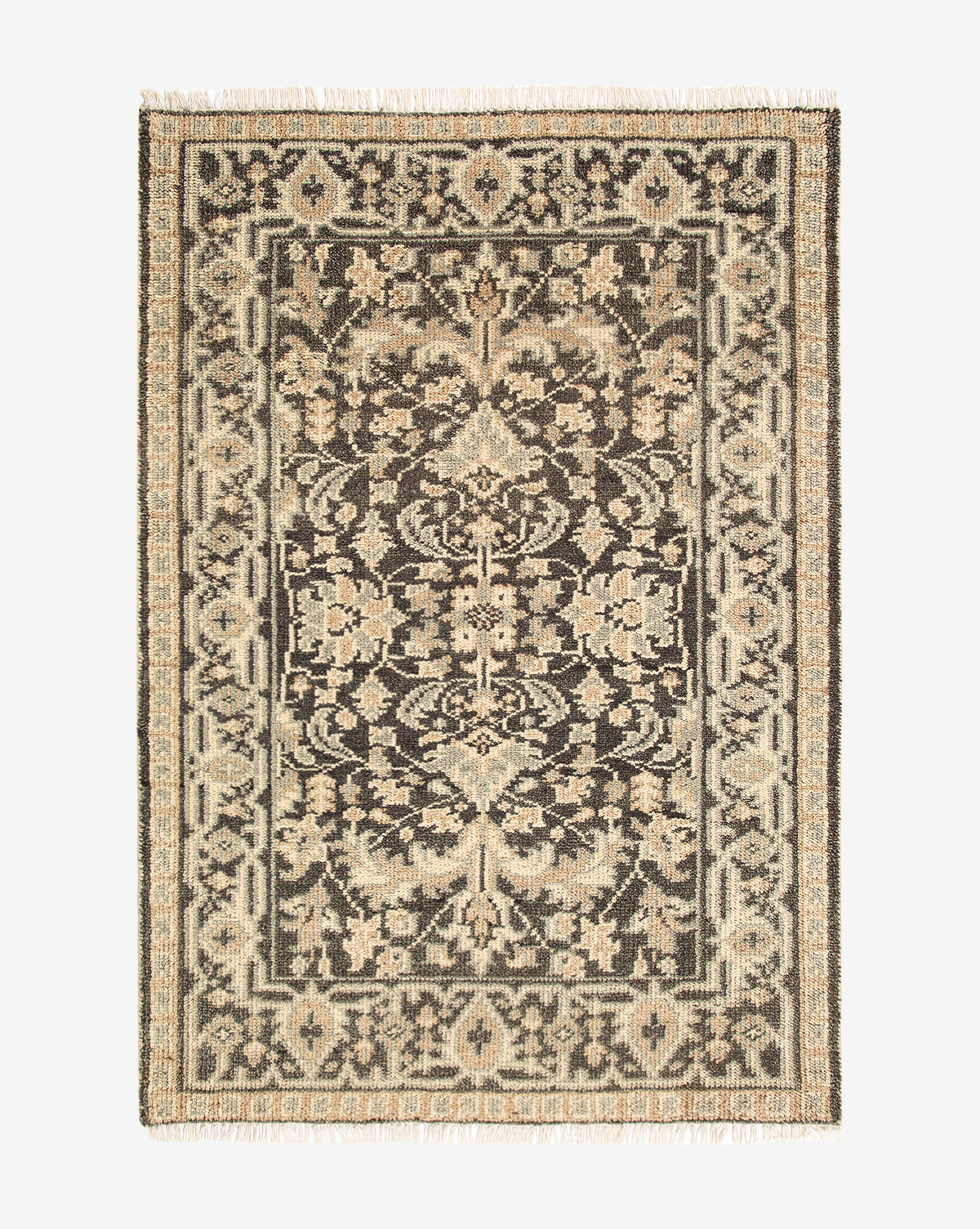 The Wayland Hand-Knotted Wool Rug is rectangular and beige with dark brown floral and geometric patterns, a detailed center, decorative border, and short fringe on the ends, by McGee & Co.